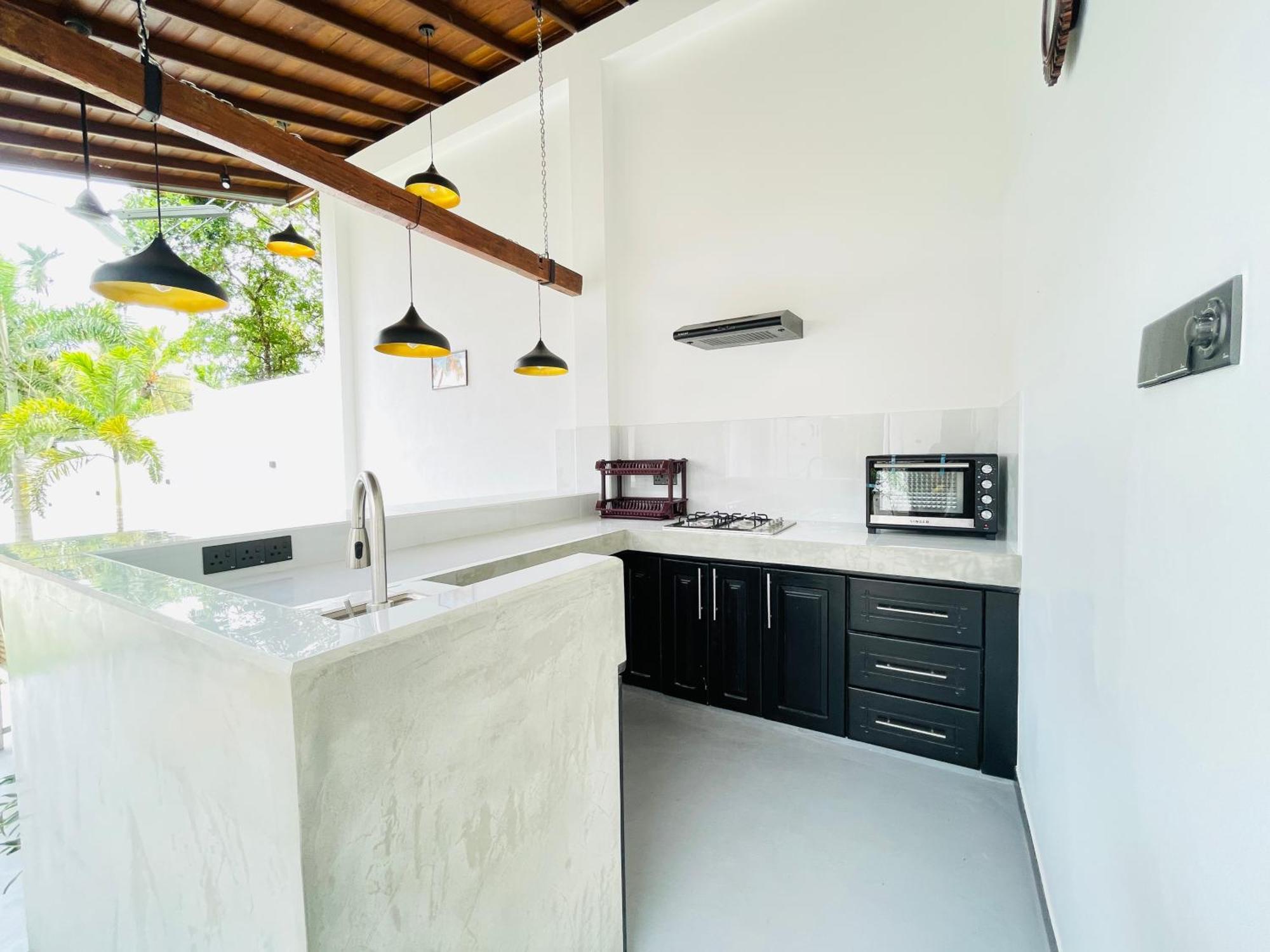 Thara Inn Villa Диквела Екстериор снимка